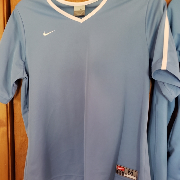 Nike Tops - Nike Light Blue Short Sleeve Athletic Top with White Stripe On Sleeves